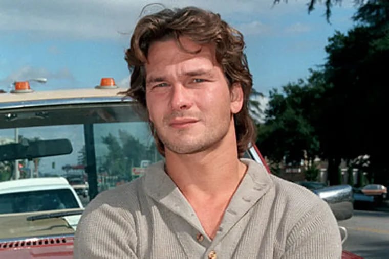 Patrick Swayze, shown in Los Angeles, in 1985, as he was becoming a film icon.  He died Monday Sept. 14, 2009 after a nearly two-year battle with pancreatic cancer. (AP Photo/Wally Fong, file)