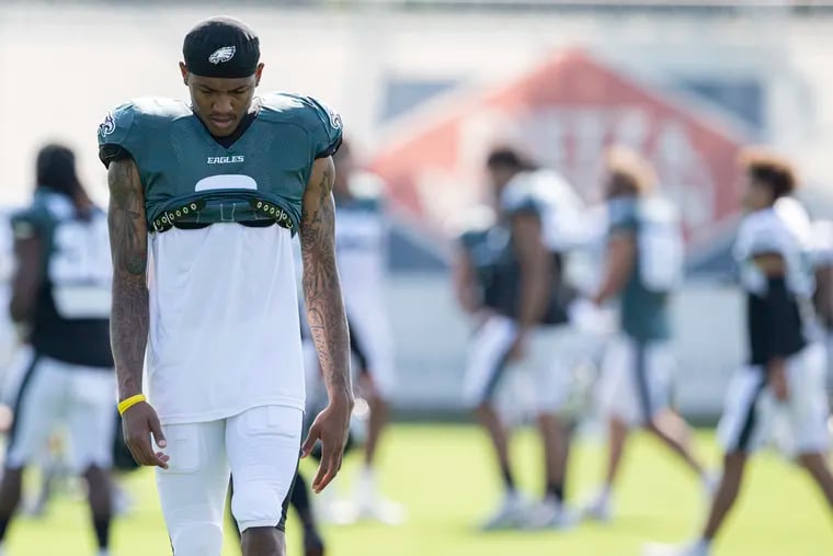 Eagles receiver DeVonta Smith walks off the field Monday at the end of a training camp practice at the NovaCare Complex.