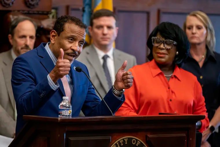 Philadelphia School Superintendent Tony Watlington, shown with Mayor Cherelle L. Parker at City Hall earlier this month, talked year-round school and teacher vacancies at Thursday's school board meeting.