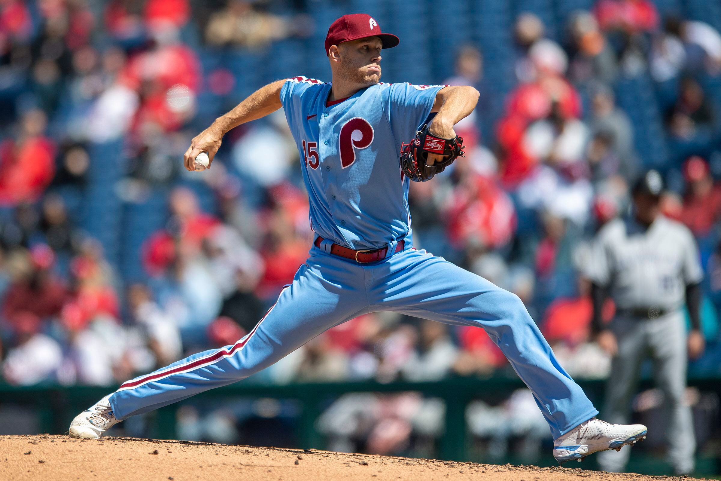 Members of the Colorado Rockies and the Philadelphia Phillies