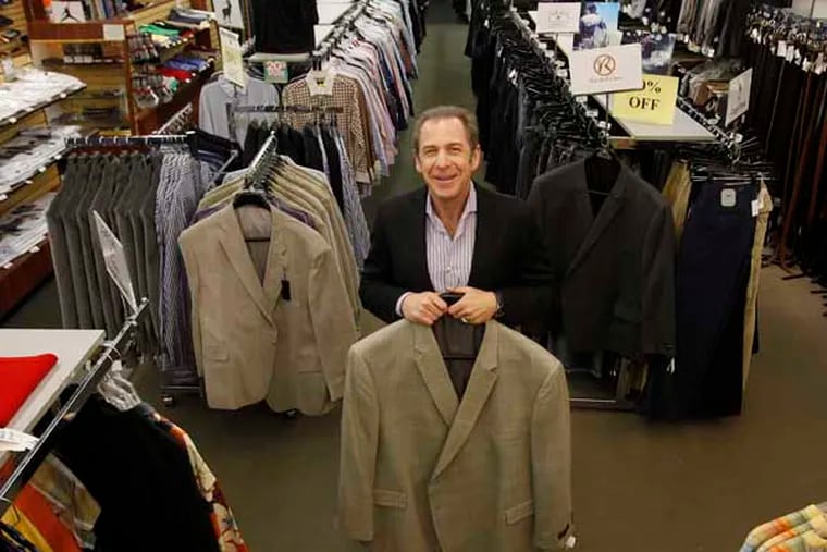 Mark Rosenfeld with an 86 portly regular sport coat. Mark Rosenfeld is closing Torre Big and Tall, his store on South Broad Street. ( MICHAEL S. WIRTZ / Staff Photographer ) March 25, 2014.