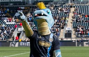 CHESTER, PA - MAY 31: Philadelphia Union mascot Phang escorts Philadelphia  Eagles center Jason