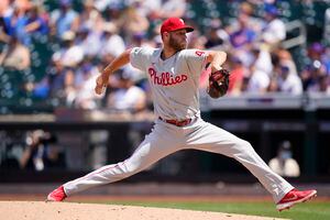 Zack Wheeler haunts Mets, Phillies earn split in Queens – Metro