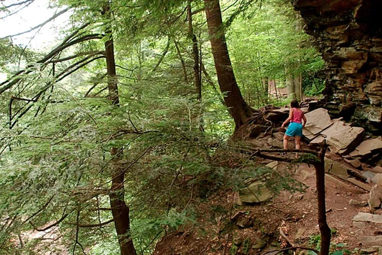 Bring sturdy shoes or hiking boots to take on Ricketts Glen State Park's trails, and resist shortcuts; the terrain can be treacherous. (Carolyn Kaster/AP)