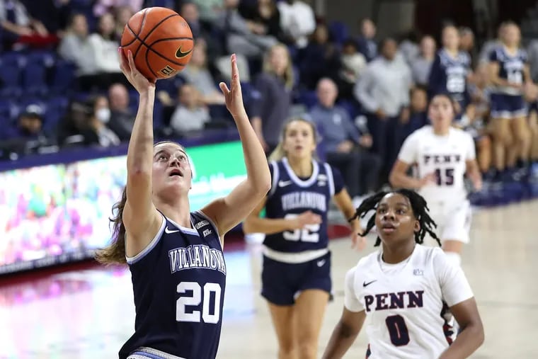 Maddy Siegrist (left) of Villanova goes up for a shot during the first half Thursday at the Palestra. Siegrist finished with a game-high 22 points and 11 rebounds.