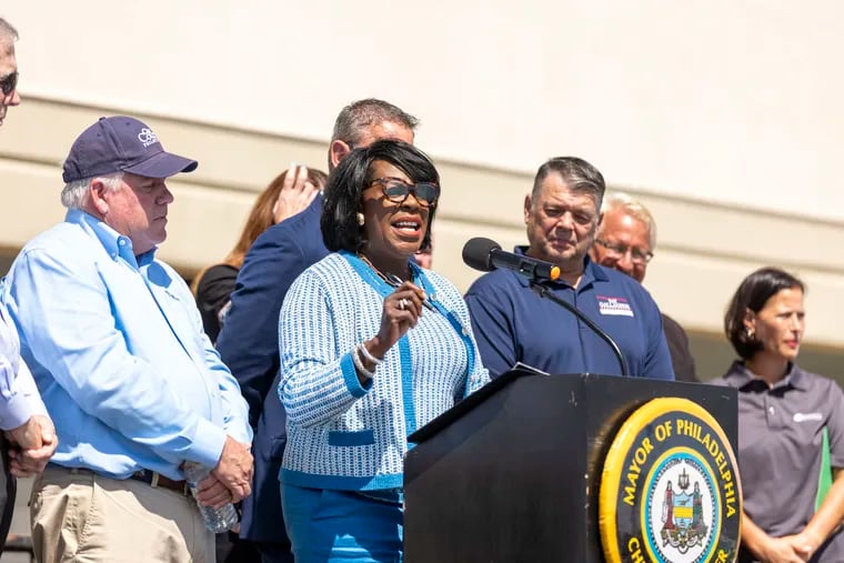 Mayor Cherelle L. Parker speaks in front of locals, officials and city workers at a news conference about her administration's inaugural citywide cleaning program in Northeast Philadelphia on Wednesday.