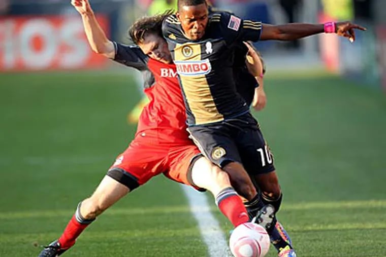 Danny Mwanga and the Union secured their first MLS playoff berth in Saturday's draw against Toronto FC. (Michael Bryant/Staff Photographer)