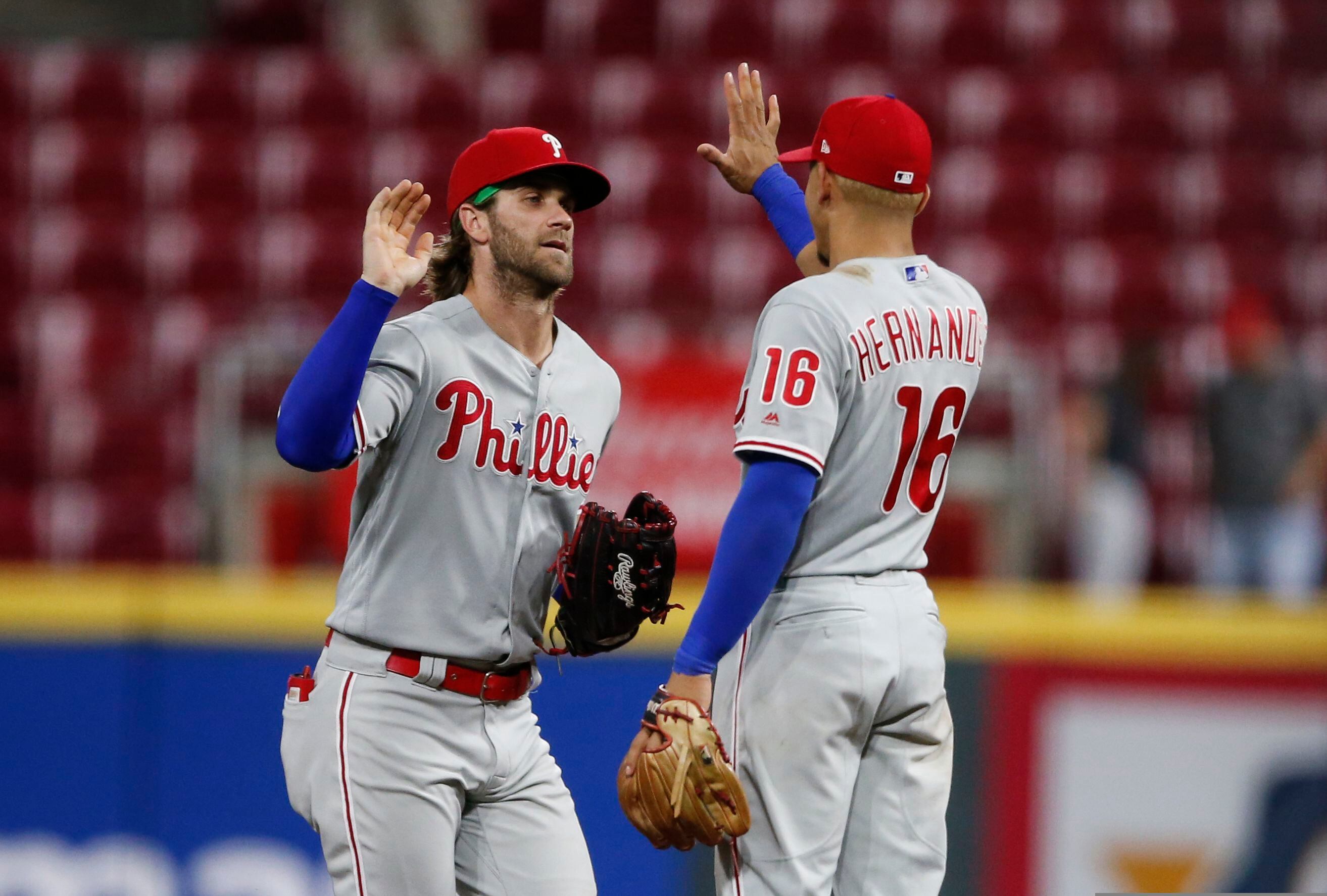 Philadelphia Phillies' Bobby Abreu, center, is congratulated by