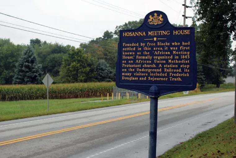 Historical marker noting the church location. (Khalil Williams/Inquirer Staff)