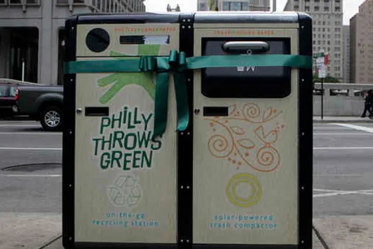 BigBellys like this one at 15th Street and JFK Boulevard will replace wire trash bins in Philadelphia. (Bonnie Weller / Staff Photographer)