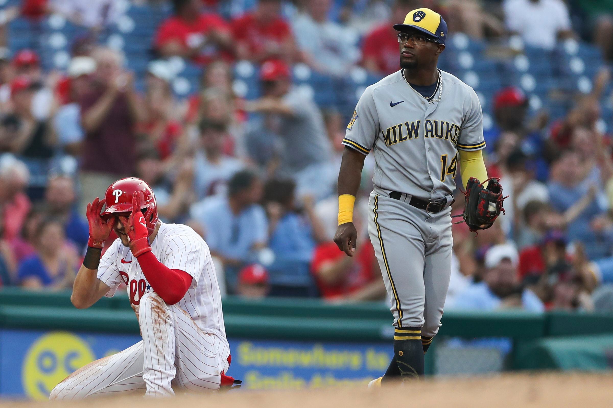 Nola, Schwarber help the Phillies beat the Brewers 4-3 for their