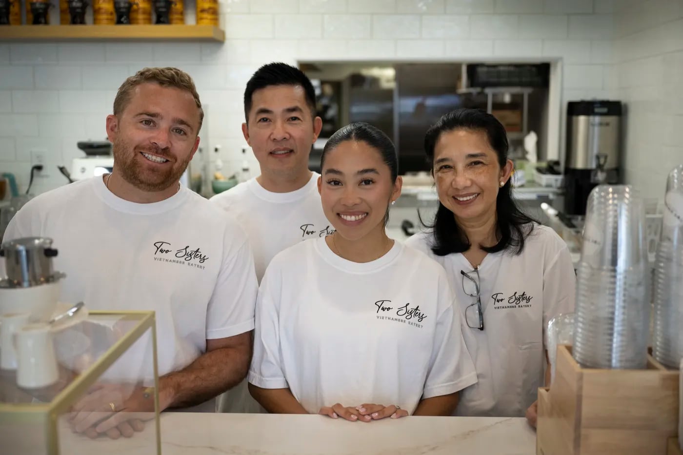 Ian Bloch (from left), Andy Phan, Tara Bloch, and Trinh Phan at their restaurant, Two Sisters Vietnamese Eatery.