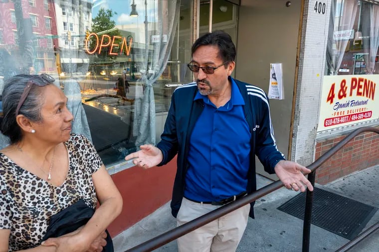 Sylvia Aviles and Erlan Dobronsky talk after they ran into each other outside the 4th & Penn St Restaurant in Reading this month. Reading is a small city with a significant Hispanic population where Republicans have been making gains with Latino voters.