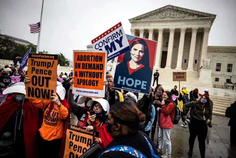 Supporters of Judge Amy Coney Barrett attempt to block and drown out pro-choice supporters outside of the U.S. Supreme Court last month.