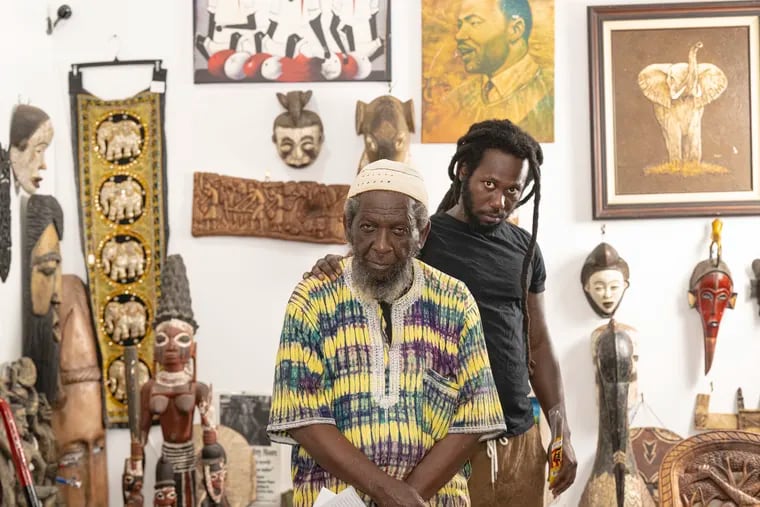 Kaddi Rahim and his father, Sharif Adur-Rahim, are photographed on Monday, Aug 12, 2024, at the African Cultural Art Forum in Philadelphia, Pa. Merchants on 52nd Street are planning Urban Art Fest 52, a community art festival for the "Main Street" of West Philadelphia.