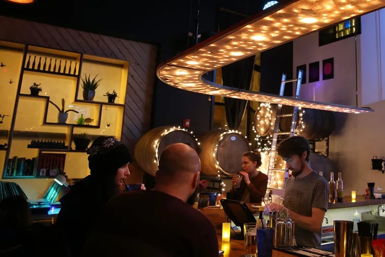 Patrons sitting at the bar inside Martha in February 2016.