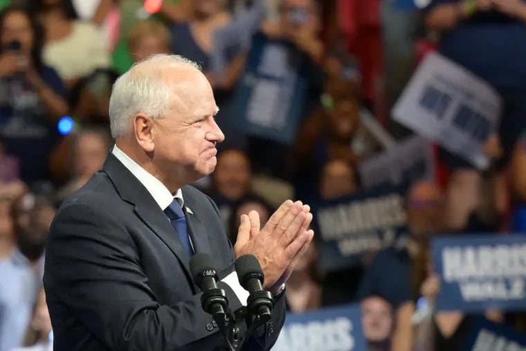 Minn. Gov. Tim Walz takes the stage after being introduced by Vice President Kamala Harris in Philadelphia on Aug. 6.