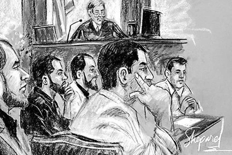 In an artist&#0039;s sketch, listening to testimony in a Camden courtroom are U.S. District Court Judge Robert Kugler (rear) and the five defendants.