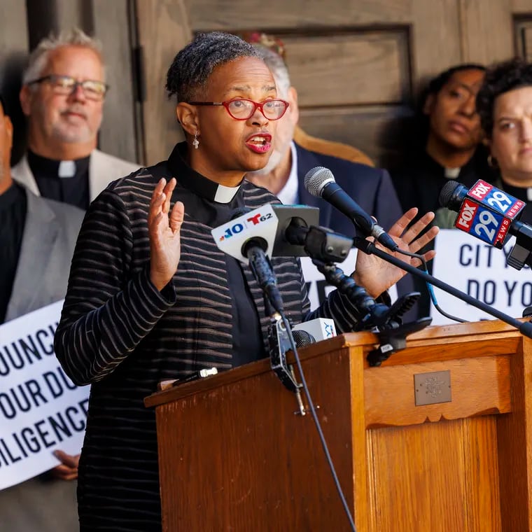 The Rev. Dr. Leslie Callahan of St. Paul’s Baptist Church speaks during a news conference of clergy with POWER, an inter-faith, multiracial coalition that gathered on the front steps of Mother Bethel AME Church earlier this month. The clergy, with support from Philadelphia City Councilman Nicolas O’Rourke (not shown), are questioning the $50 million dollar community benefits agreement that could be part of the Sixers Center City arena deal.