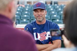 Pitching coach Andy Pettitte and manager Mark DeRosa of Team USA pose  News Photo - Getty Images