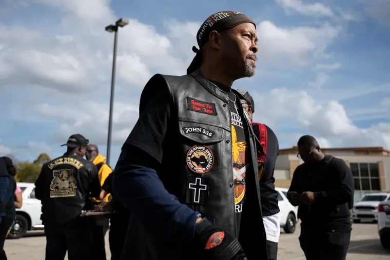 Rev. Alyn Waller of Enon Tabernacle Baptist Church looks on after rallying fellow bikers for a "Black Bikers Vote" procession, Saturday, Nov. 5, 2022, in Philadelphia.