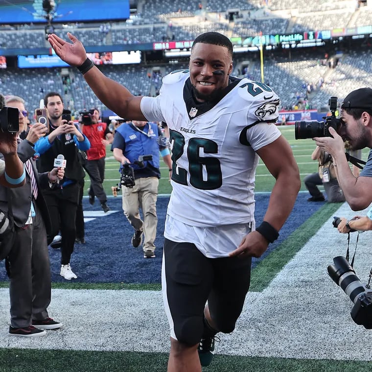 Eagles running back Saquon Barkley runs off the field after the 28-3 rout of the New York Giants at MetLife Stadium.