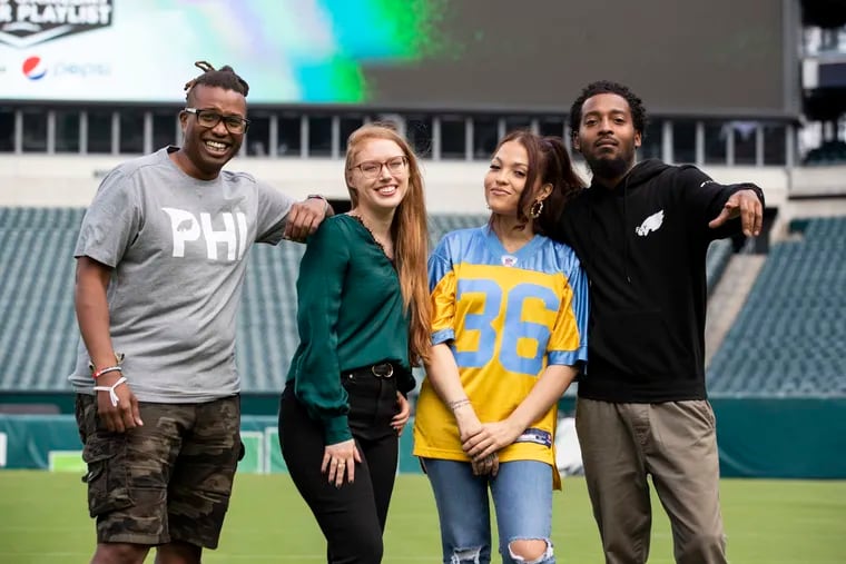 (left to right) Artists Keni Thomas and Rachel Perciphone Kilbury and musicians Brianna Castro and Chill Moody posed for a portrait at Lincoln Financial Field in Philadelphia, Pa. on Thursday, September 8, 2022.