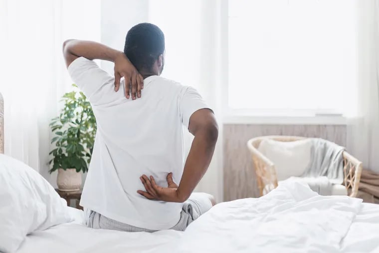 About 80% of adults in the U.S. will experience low back pain at some point. (Dreamstime/TNS)