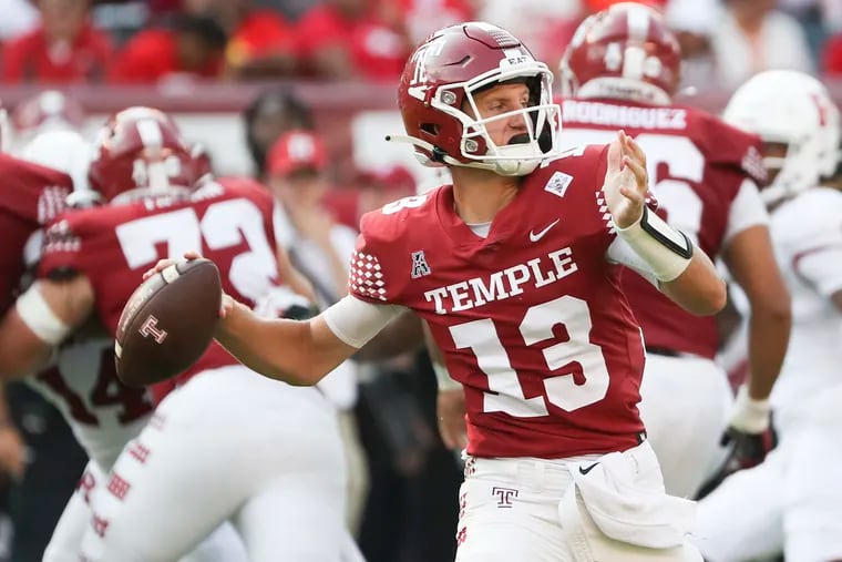 Temple quarterback E.J. Warner, throwing a pass against Rutgers, and the Owls are seeking their first conference win.