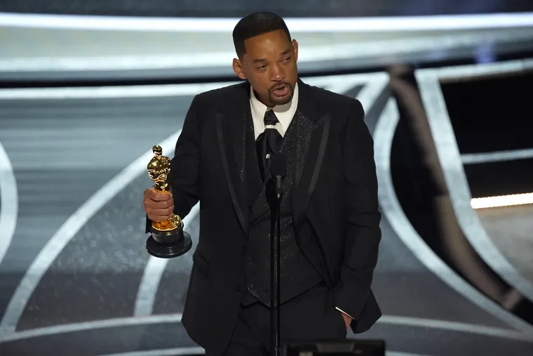 Will Smith cries as he accepts the award for best performance by an actor in a leading role for "King Richard" at the Oscars on Sunday at the Dolby Theatre in Los Angeles.