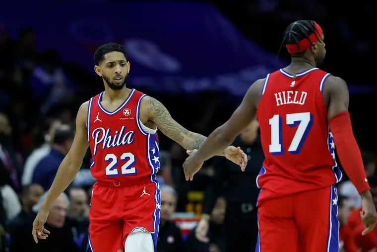 Sixers guard Cameron Payne with teammate guard Buddy Hield against the Atlanta Hawks on Friday, February 9, 2024 in Philadelphia.