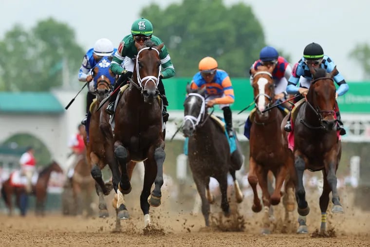 Mindframe #11, with Irad Ortiz Jr. aboard, leads a undercard race to the first turn ahead of the 150th running of the Kentucky Derby at Churchill Downs on May 04, 2024 in Louisville, Kentucky. (Photo by Michael Reaves/Getty Images)