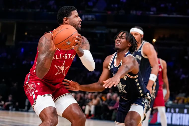 Tyrese Maxey defends his new teammate, Paul George, during the 2024 NBA All-Star Game.