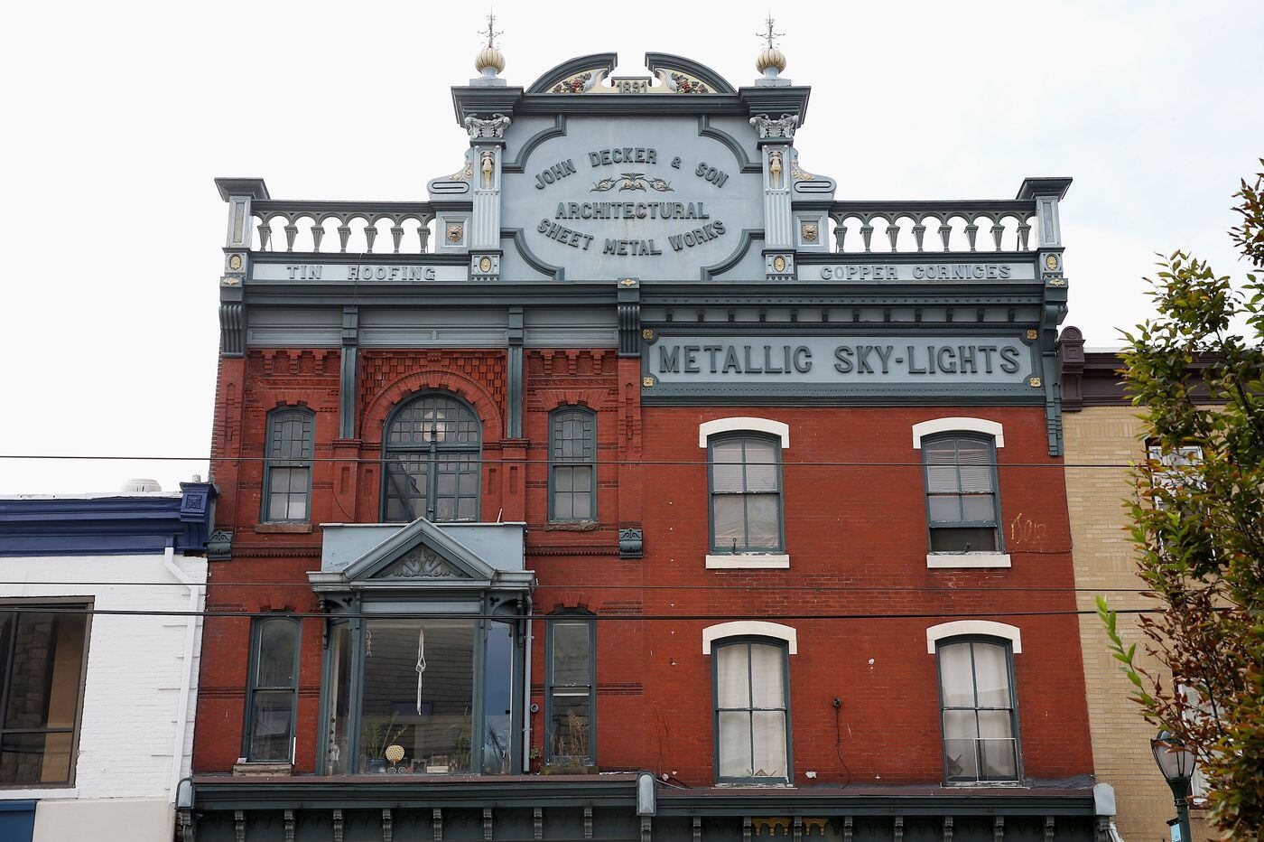 Three Decorative Metal Signs Reveal The History Of Philly S