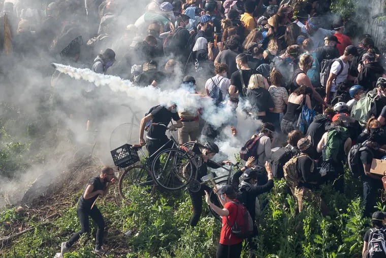 Tear gas is fired at protesters on I-676 in Philadelphia on June 1, 2020.