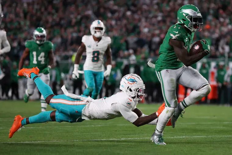 Philadelphia Eagles wide receiver A.J. Brown evades a tackle to make a touchdown against the Miami Dolphins at Lincoln Financial Field on Sunday, Oct. 22, 2023, in Philadelphia , PA.