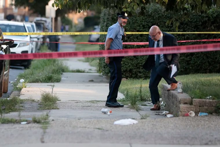 Police investigate the scene on the 4000 block of Meridian Street in Philadelphia where a 7-month-old baby was shot in the leg on Thursday evening, July 18, 2024.