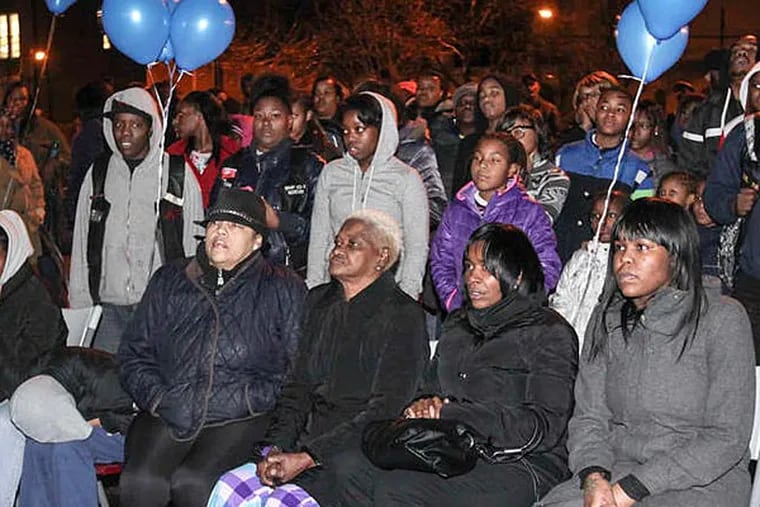 Quahdir Devine's life was honored by family and friends at East Poplar Playground in North Philly last night. The 18-year-old basketball standout was gunned down on New Year's Eve. (Steven M. Falk/Staff)