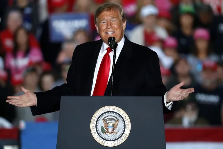 President Trump speaks during a rally at Southern Illinois Airport in Murphysboro, Ill, last week. Eager to focus voters on immigration in the lead-up to the midterm elections, Trump escalated his threats against a migrant caravan trudging slowly toward the U.S. border.