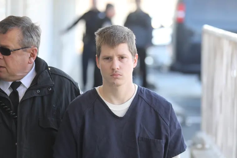 In a file photo, David Strowhouer is walked into his preliminary hearing at district court in Linwood, Pa., on Tuesday, March 12, 2019.