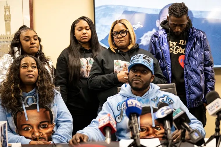 Dawn Fobbs and Eric Coates, the parents of Eric Harrison, speak to the media during a news conference announcing a lawsuit. Their son was fatally stabbed last month while working at Macy's.