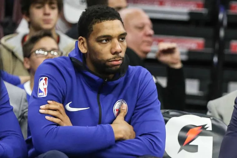 The Sixers&#039; Jahlil Okafor sits on the bench watching his team play the Hawks at the Wells Fargo Center on Wednesday, November 1, 2017.