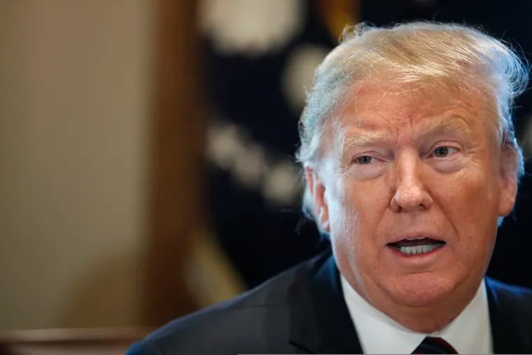 President Donald Trump leads a roundtable discussion on border security with local leaders, Friday, Jan. 11, 2019, in the Cabinet Room of the White House in Washington. (AP Photo/Jacquelyn Martin)