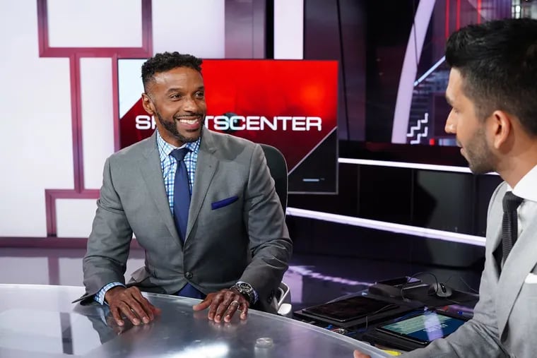 ESPN's Ryan Smith signed a new contract that will keep him on "SportsCenter" and "Outside the Lines."