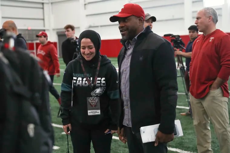 Eagles pro scout Ameena Soliman speaks with Temple football head coach Stan Drayton at the 2022 Temple Pro Day inside Temple’s Aramark STAR Complex in Philadelphia on Wednesday, March 23, 2022.