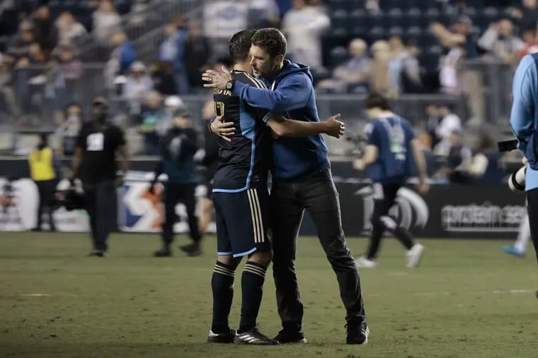 Alejandro Bedoya (left) embraces FC Cincinnati manger Pat Noonan, who used to be the Union's top assistant coach, after Saturday's season-ending 2-1 loss at Subaru Park.