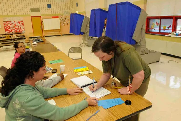 Rosanne Dunn of Bensalem was one of the few voters to sign up to cast her ballot at Cornwells Elementary School in Bucks County. She was the 92d person out of 1,922 registered voters as of 1 p.m. Tuesday.