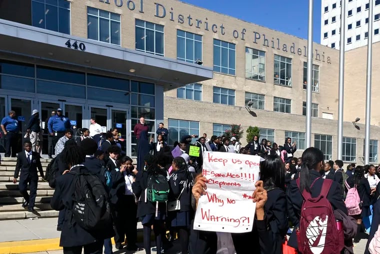 Students at Mathematics, Civics and Sciences Charter, gather outside school district headquarters on North Broad Street, after leaving their school in protest Oct. 11.  Founder and chief administrative officer Veronica  Joyner announced In a letter to parents that the school that has operated for nearly a quarter of a century will close at the end of the school year.