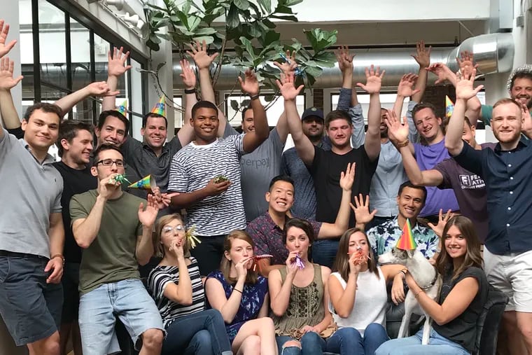 Perpay staff in 2019. The fast-growing Center City company helps corporate employees buy furniture and appliances through direct payroll deductions, without the need for bank cards. Founder Christian DiMarco is at rear in the gray Perpay shirt.