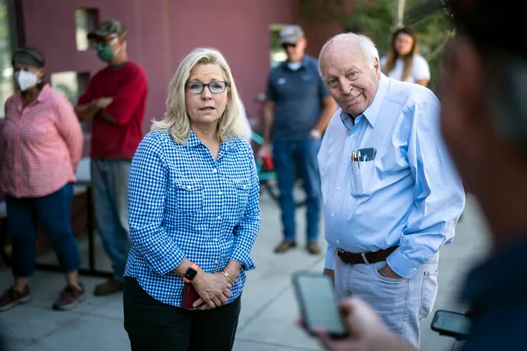 Liz Cheney (left) with her father, former Vice President Dick Cheney, in 2022.